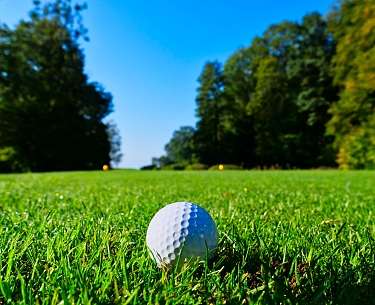 splash cam ufcDM0ApEBs unsplash white golf ball ready to tee off